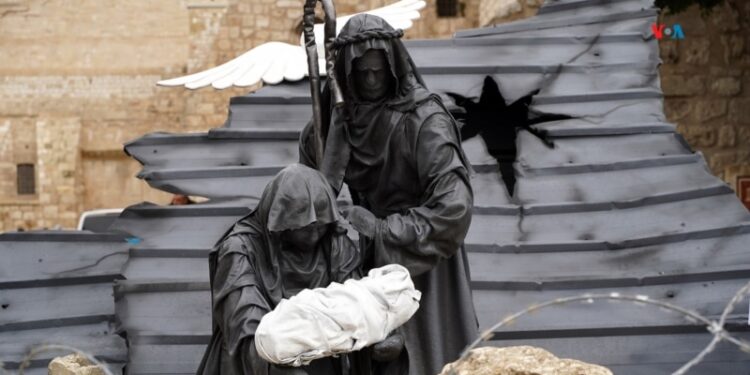 En fotos: Esta Navidad en Belén con el niño Jesús entre rocas y alambres