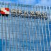 Evergrande y sus filiales paran su cotización tras desplomarse por orden de liquidación