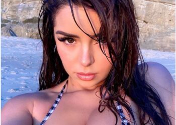 Demi Rose enloquece a sus fans posando en el mar con vestido semitransparente
